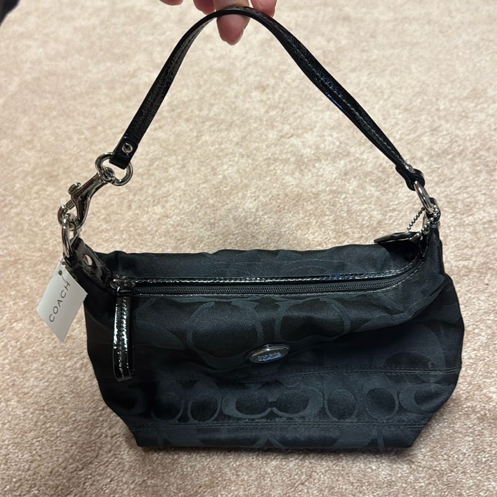 Coach mini purse black NEW and never worn